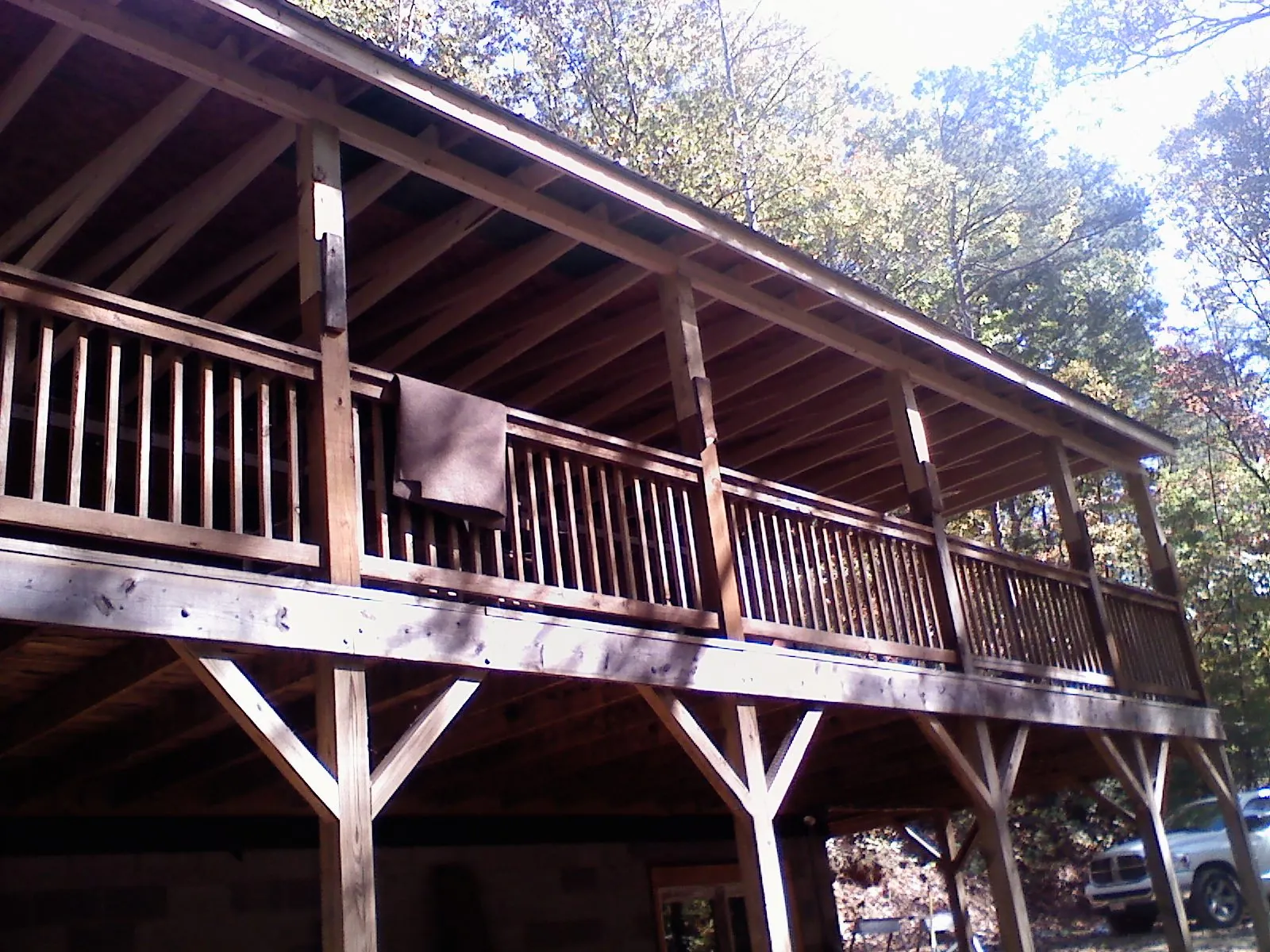Timber framing under a new elevated porch and deck — Roof Leak Repair in Smock by Roofing Brothers
